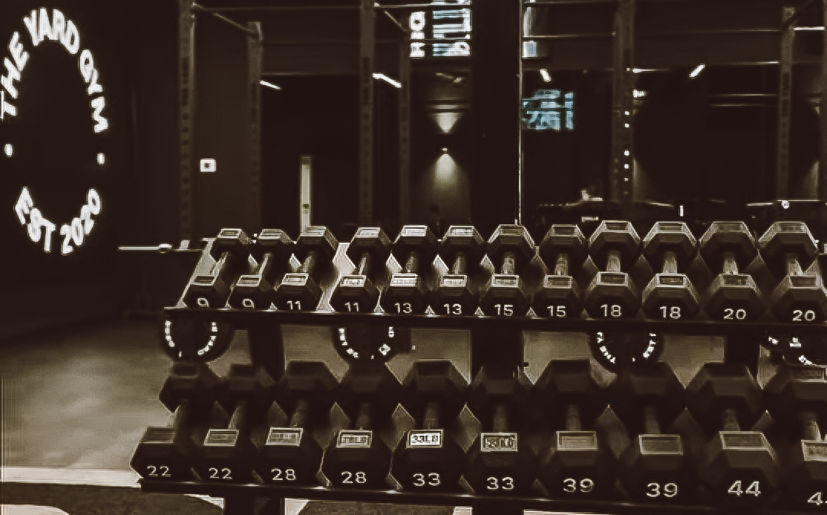 Gym interior showing open ceilings and modern industrial design